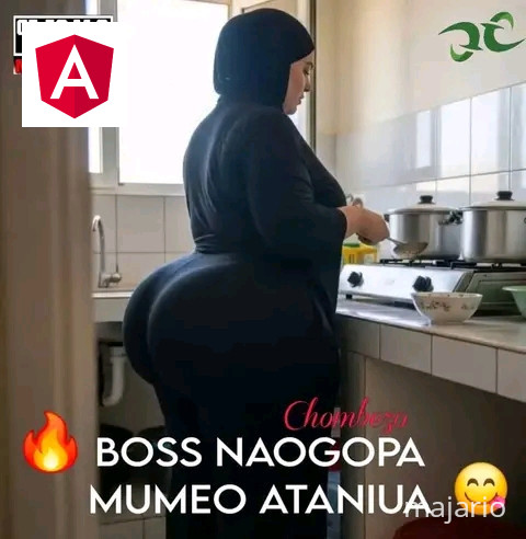 A person in a purple dress is cooking over an open fire inside a rustic kitchen with stone walls and a small window.